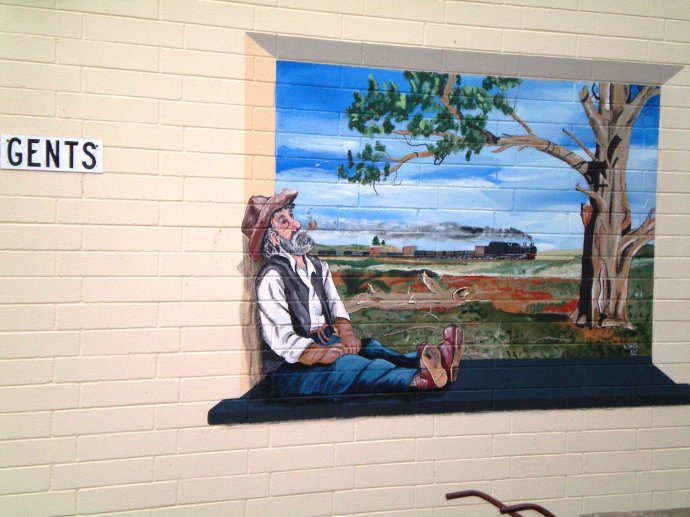 Artwork outside the Gents